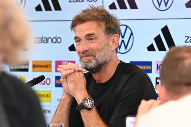 24 July 2026, Hesse, Frankfurt/Main: Juergen Klopp sits on the podium during a press conference to introduce the new national team head coach. Photo: Jennifer Brückner/dpa