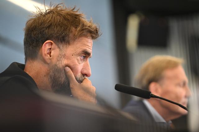 24 July 2026, Hesse, Frankfurt/Main: Juergen Klopp sits on the podium during a press conference to introduce the new national team head coach. Photo: Florian Wiegand/dpa