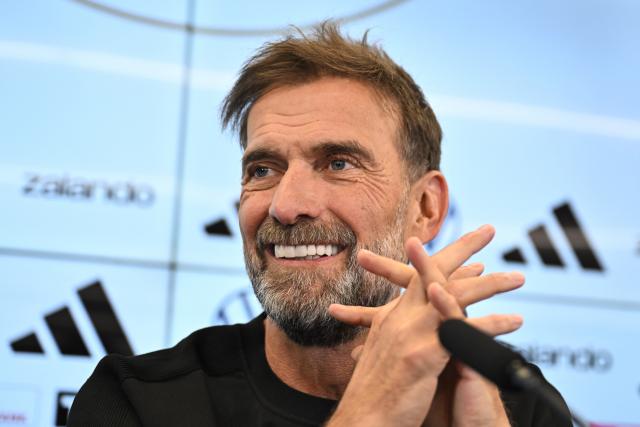 24 July 2026, Hesse, Frankfurt/Main: Juergen Klopp sits on the podium during a press conference to introduce the new national team head coach. Photo: Florian Wiegand/dpa