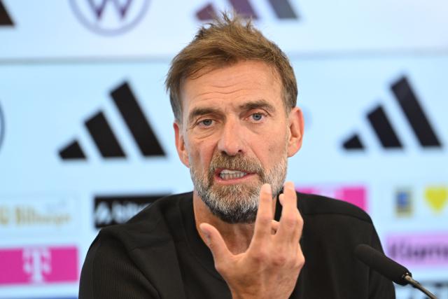 24 July 2026, Hesse, Frankfurt/Main: Juergen Klopp reacts during a press conference to introduce the new national team head coach. Photo: Florian Wiegand/dpa