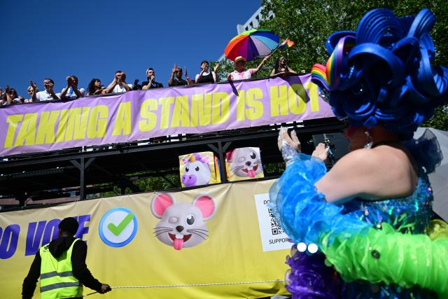 25 July 2026, Berlin: A banner reads "Taking a Stand Is Hot" during Christopher Street Day (CSD) in Berlin. For the first time, Berlin's CSD is taking place over two days. Photo: Fabian Sommer/dpa