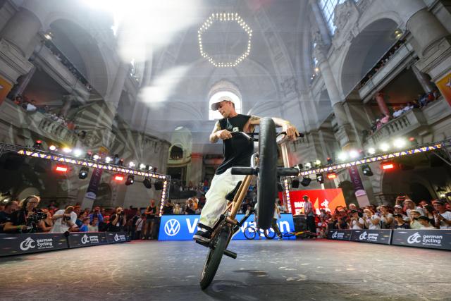 25 July 2026, Lower Saxony, Hanover: Germany's Dustyn Alt, from Leipzig, competes on stage during the BMX Flatland German Championship, men's division, at the New City Hall. Photo: Robert Michael/dpa