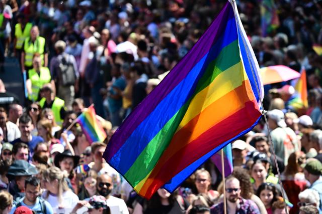 25 July 2026, Berlin: People demonstrate under the slogan "Attitude is Hot" during Christopher Street Day (CSD) in Berlin. For the first time, Berlin's CSD is taking place over two days. Photo: Fabian Sommer/dpa