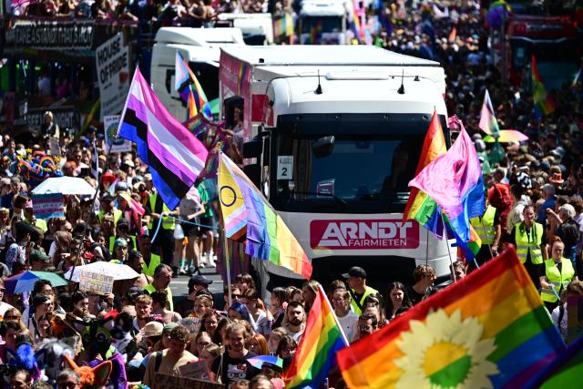 25 July 2026, Berlin: People demonstrate under the slogan "Attitude is Hot" during Christopher Street Day (CSD) in Berlin. For the first time, Berlin's CSD is taking place over two days. Photo: Fabian Sommer/dpa