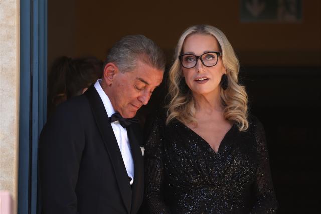 25 July 2026, Bavaria, Bayreuth: German Journalist Michel Friedman (L) and Katharina Wagner, artistic director and managing director of the Bayreuth Festival, arrive at the Festspielhaus for the opening of the Richard Wagner Festival. The Bayreuth Festival kicks off its 150th anniversary with Ludwig van Beethoven's Ninth Symphony. Photo: Karl-Josef Hildenbrand/dpa