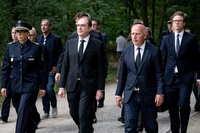 26 July 2026, Berlin: Alexander Dobrindt (C), German Minister of the Interior; Kai Wegner (2-R), Governing Mayor of Berlin; and Barbara Slowik Meisel (L), Chief of the Berlin Police, arrive at the scene of the incident. On the sidelines of Christopher Street Day in Berlin, a vehicle plowed into a crowd. One woman was killed, and 16 other people were injured, some seriously. Photo: Fabian Sommer/dpa