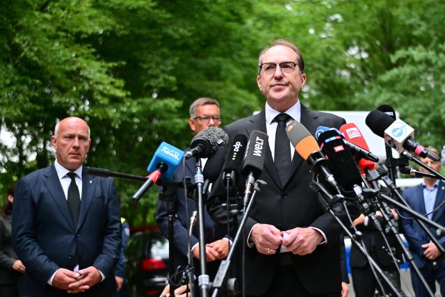 26 July 2026, Berlin: Alexander Dobrindt (R), German Minister of the Interior, speaks to the press. Behind him stands Kai Wegner (L), Governing Mayor of Berlin. On the sidelines of Christopher Street Day in Berlin, a vehicle plowed into a crowd. One woman was killed, and 16 other people were injured, some seriously. Photo: Sebastian Gollnow/dpa