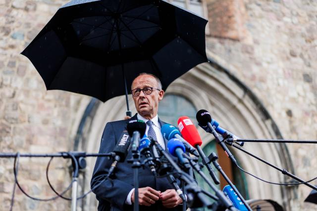 26 July 2026, Berlin: German Chancellor Friedrich Merz issues a statement to the press, at the scene where a vehicle had driven into a crowd of people on the sidelines of Christopher Street Day in Berlin. Photo: Christoph Soeder/dpa