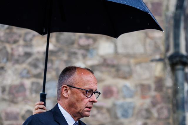 26 July 2026, Berlin: German Chancellor Friedrich Merz issues a statement to the press, at the scene where a vehicle had driven into a crowd of people on the sidelines of Christopher Street Day in Berlin. Photo: Christoph Soeder/dpa