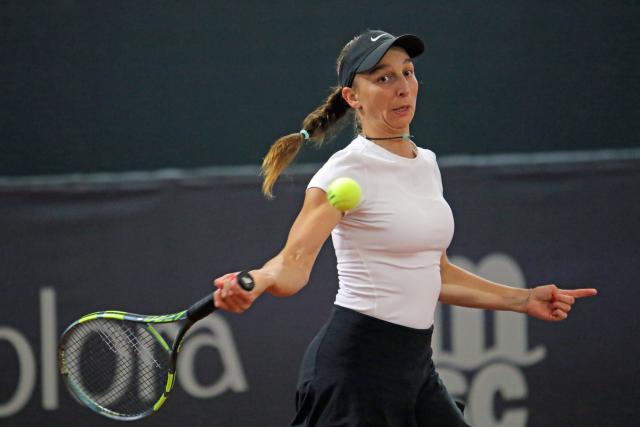 26 July 2026, Hamburg: Germany's Tamara Korpatsch in action against Hungary's Anna Bondar during their women's singles final match of the Hamburg Open tennis tournament. Photo: Markus Tischler/dpa