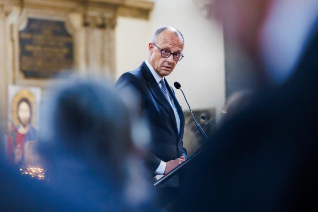 26 July 2026, Berlin: German Chancellor Friedrich Merz speaks during a church service at St. Mary's Church after a vehicle had driven into a crowd of people on the sidelines of Christopher Street Day in Berlin. Photo: Christoph Soeder/dpa