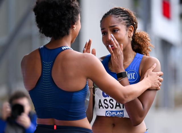 26 July 2026, North Rhine-Westphalia, Bochum: Germany's Malaika Mihambo (L) congratulates Mikaelle Assani on her victory after the Women's Long Jump Final of the German Championships at Lohrheidestadion. Photo: Sven Hoppe/dpa