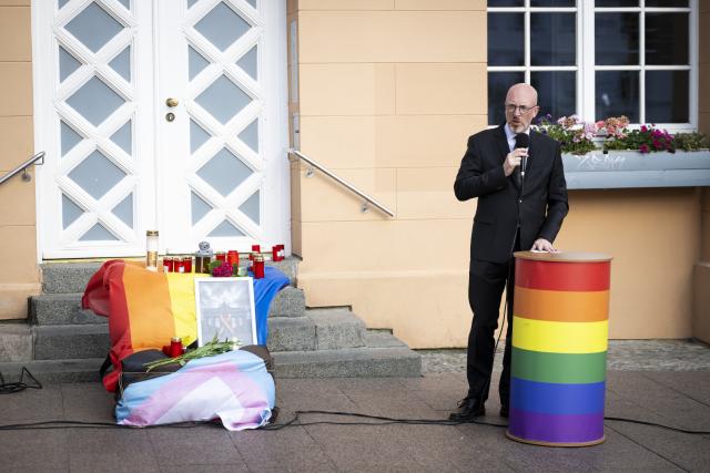 27 July 2026, Mecklenburg-Western Pomerania, Schwerin: Minister of the Interior of Mecklenburg-Western Pomerania Christian Pegel delivers a speech during a vigil at Schwerin's market square. Following the suspected Islamist terrorist attack on the sidelines of Christopher Street Day (CSD) in Berlin, the Schwerin CSD Association has called for a vigil in Mecklenburg-Western Pomerania's state capital. Photo: Philip Dulian/dpa