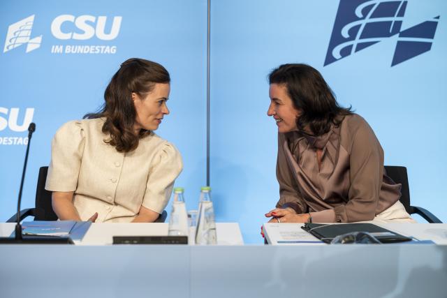 28 July 2026, Bavaria, Bad Staffelstein: Bonita Grupp (L), managing partner of Trigema W. Grupp KG, talks with Dorothee Baer (R), deputy chair of the CSU, at Banz Abbey. The meeting took place during the final day of the CSU parliamentary group's summer retreat. Photo: Daniel Vogl/dpa