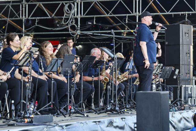 29 July 2026, Schleswig-Holstein, Wacken: The Wacken Fire Department Band kicks off the Wacken Open Air (W:O:A) with its concert. The W:O:A is considered the world's largest heavy metal festival. Photo: Frank Molter/dpa