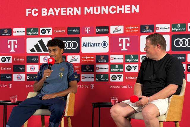 29 July 2026, Bavaria, Rottach-Egern: Bayern Munich's new signing Nathaniel Brown (L) attends his presentation press conference with sporting director Max Eberl in Rottach-Egern. Photo: Christian Kunz/dpa