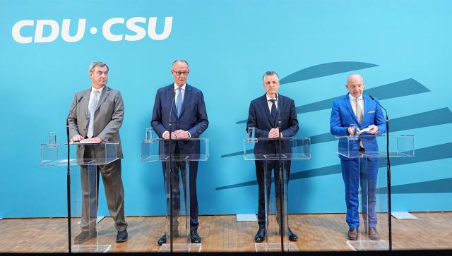 29 July 2026, Berlin: (L-R) Minister President of Bavaria Markus Soeder, German Chancellor Friedrich Merz, Thorsten Frei, the new chairman of the Christian Democratic Union (CDU) and the Christian Social Union (CSU) parliamentary group in the Bundestag, and chair of the CSU regional group in the Bundestag Alexander Hoffmann speak during a press conference following a special meeting of the CDU/CSU parliamentary group to elect its chairman. Photo: Michael Kappeler/dpa