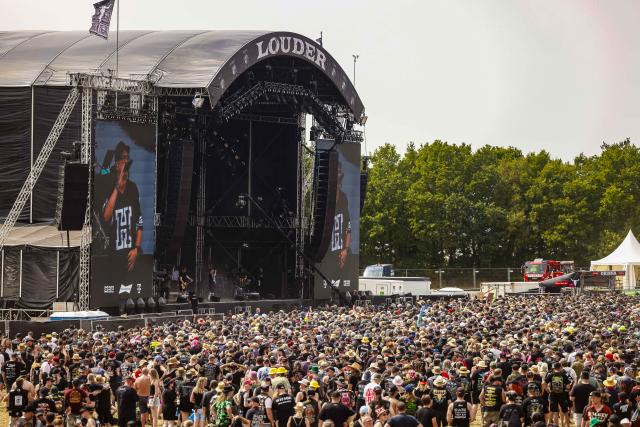 30 July 2026, Schleswig-Holstein, Wacken: Fans attend at a concert by the band H-Blockx in front of the "Louder" stage at Wacken Open Air (W:O:A) festival. W:O:A is considered the world's largest heavy metal festival. Photo: Frank Molter/dpa
