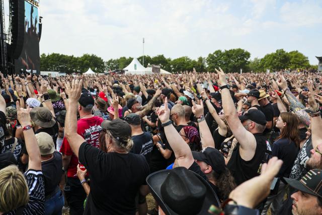 30 July 2026, Schleswig-Holstein, Wacken: Fans attend at a concert by the band H-Blockx in front of the "Louder" stage at Wacken Open Air (W:O:A) festival. W:O:A is considered the world's largest heavy metal festival. Photo: Frank Molter/dpa