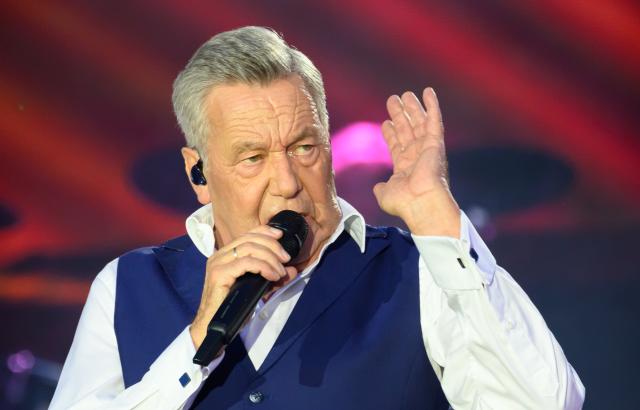31 July 2026, Saxony, Dresden: German singer Roland Kaiser performs on the stage at the opening concert of "Kaisermania 2026" during the Film Nights on the Banks of the Elbe. Photo: Robert Michael/dpa