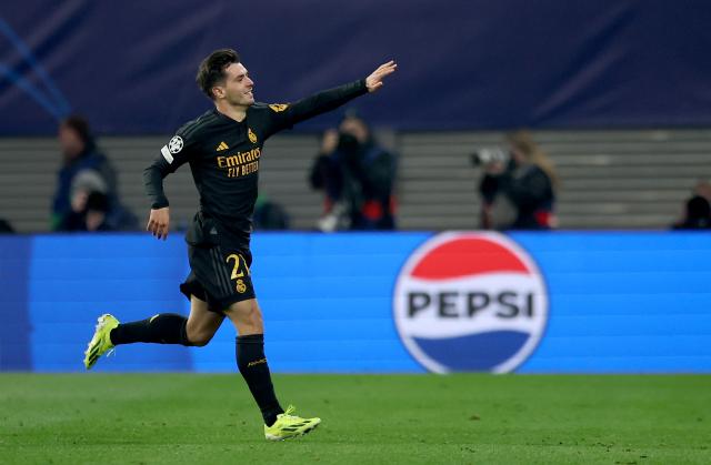 FILED - 13 February 2024, Saxony, Leipzig: FILE PHOTO - Real Madrid's Brahim Diaz celebrates scoring his side's first goal during the UEFA Champions League round of 16 first leg soccer match between RB Leipzig and Real Madrid at the Red Bull Arena. Photo: Jan Woitas/dpa