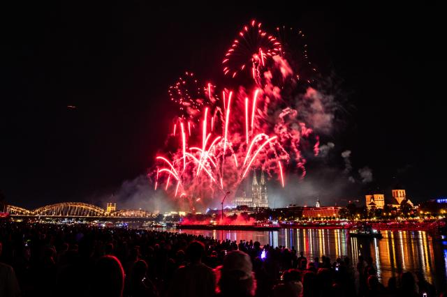 02 August 2026, North Rhine-Westphalia, Cologne: The 'Kölner Lichter' (Cologne Lights) fireworks display lights up the sky over the Rhine River. Photo: Christian Knieps/dpa