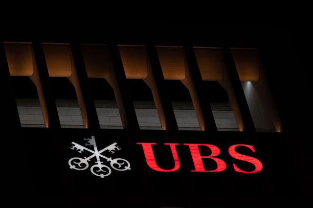 FILED - 10 December 2021, Frankfurt: FILE PHOTO - A view of the UBS Group AG logo on the bank's headquarters in down town Frankfurt. Photo: Sebastian Gollnow/dpa
