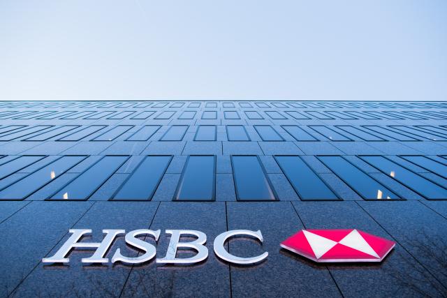 FILED - 13 February 2017, Duesseldorf: FILE PHOTO - The logo of the HSBC Bank is pictured on the facade of a bank branch in Duesseldorf. Photo: Rolf Vennenbernd/Deutsche Presse-Agentur GmbH/dpa