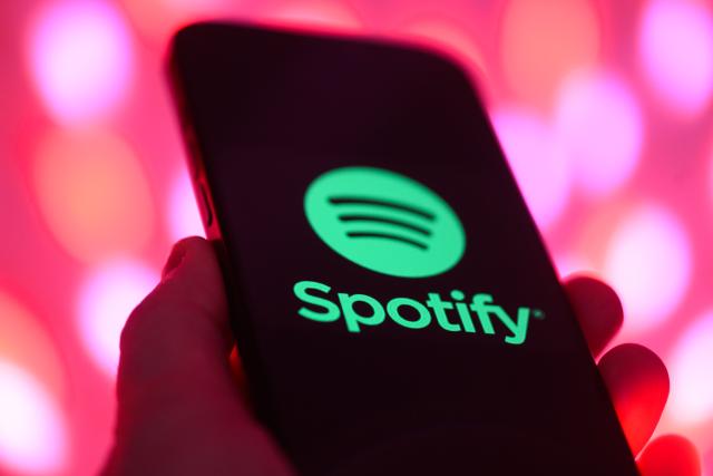 FILED - 02 December 2025, Saxony, Dresden: FILE PHOTO - The logo of the music streaming provider Spotify can be seen on a smartphone in Dresden. Photo: Robert Michael/dpa