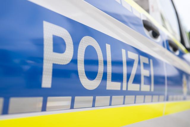FILED - 07 July 2026, Baden-Württemberg, Karlsruhe: File Photo -  German Police patrol car bearing the word "Polizei" is parked in front of the Federal Constitutional Court. Photo: Uli Deck/dpa