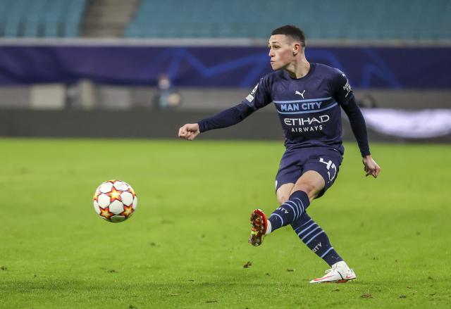 FILED - 07 December 2021, Saxony, Leipzig: FILE PHOTO - Manchester City's Phil Foden in action during the UEFA Champions League group A soccer match between RB Leipzig and Manchester City at Red Bull Arena. Photo: Jan Woitas/dpa-Zentralbild/dpa