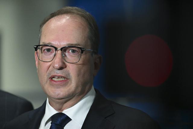 05 August 2026, Saxony, Schkeuditz: Alexander Dobrindt, German Minister of the Interior, speaks at a press conference in a terminal at Leipzig/Halle Airport, following a night-time drone incident. German Police specialists defused an explosive device. Photo: Hendrik Schmidt/dpa