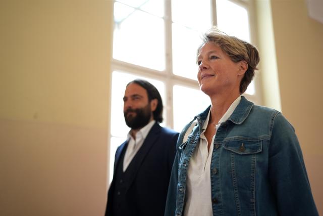 07 August 2026, Hamburg: Christina Block (R), a German restaurateur and entrepreneur, and attorney Ingo Bott, Block's defence counsel, arrive at the courtroom for the trial over charges of alleged child abduction at Hamburg Regional Court. According to the indictment, masked men brought two of Block's children from Denmark to Germany on New Year's Eve 2023/24. The trial over the alleged abduction is taking place at Hamburg Regional Court, with Block among those on trial. Photo: Marcus Brandt/dpa