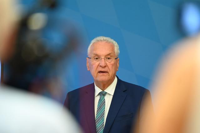 07 August 2026, Bavaria, Munich: German Interior Minister Joachim Herrmann attends a press conference to present the State Office for the Protection of the Constitution's report for the first half of 2026, alongside Manfred Hauser, president of the Bavarian State Office for the Protection of the Constitution. Photo: Florian Diettrich/dpa