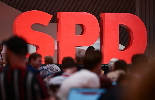 FILED - 19 June 2026, Baden-Württemberg, Ulm: File Photo - Delegates sit in front of a party logo at the SPD Baden-Württemberg state party convention in the Donauhalle. Photo: Bernd Weißbrod/dpa