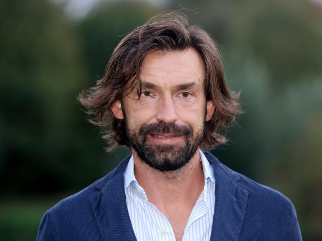 FILED - 22 October 2018, North Rhine-Westphalia, Duisburg: FILE PHOTO - Former World Cup winner Andrea Pirlo smiles at a wine presentation in a hotel. Photo: Roland Weihrauch/dpa