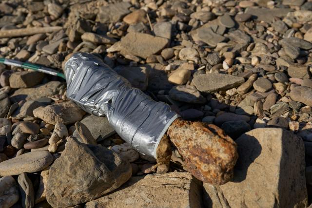 11 August 2026, Rhineland-Palatinate, Koblenz: A World War II bazooka rocket is detonated in a controlled explosion on the Rhine. The rocket is placed inside a sandbag before being safely detonated. Photo: Sascha Ditscher/dpa
