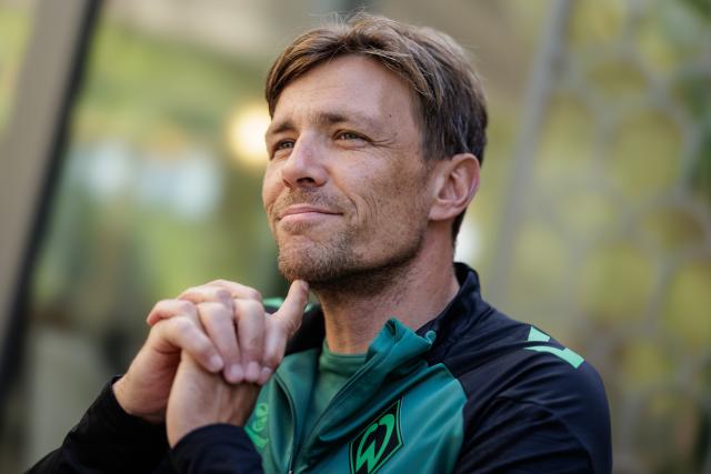 11 August 2026, North Rhine-Westphalia, Harsewinkel: Clemens Fritz, sporting director of Werder Bremen reacts during an interview at the summer training camp at the Hotel-Residence Klosterpforte. Photo: David Ebener/dpa
