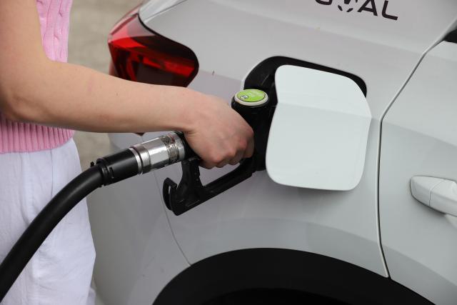 FILED - 08 July 2026, North Rhine-Westphalia, Cologne: FILE PHOTO - A woman fills up a car with gas. Photo: Sascha Thelen/dpa
