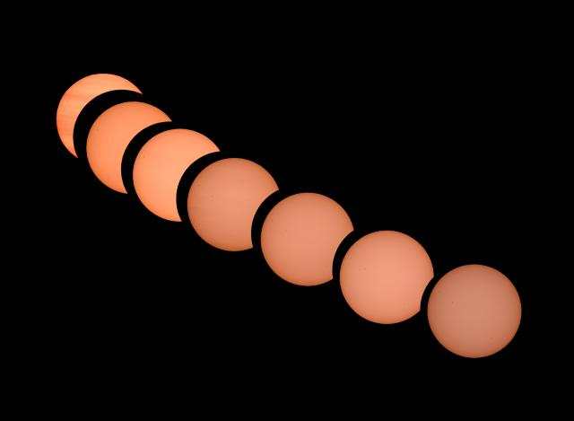 13 August 2026, Brandenburg, Jacobsdorf: A collage of seven individual photos shows the progression of the solar eclipse. On August 12, 2026, a significant partial solar eclipse took place over Germany, during which the moon obscured 80 to 90 percent of the sun, depending on the region, transforming it into a narrow crescent. Photo: Patrick Pleul/dpa