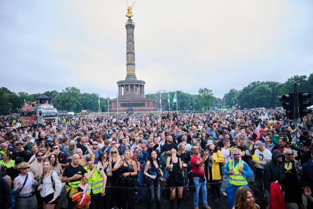FILED - 12 July 2025, Berlin: File Photo - Thousands of people dance to the music of the techno parade Rave The Planet. Photo: Annette Riedl/dpa