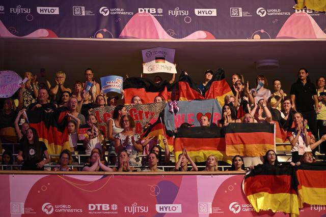 14 August 2026, Hesse, Frankfurt/M.: Spectators cheer during the women's individual all-around final at the Rhythmic Gymnastics World Championships. Photo: Marijan Murat/dpa