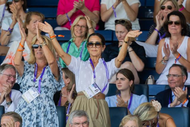 14 August 2026, North Rhine-Westphalia, Aachen: Queen Mary of Denmark (top, centre) applauds during the individual Grand Prix Special final at the World Championships. Photo: Rolf Vennenbernd/dpa