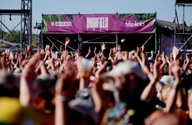 14 August 2026, Saxony, Großpösna: Visitors attend the Highfield Festival, where around 28,000 fans are expected. The festival is being held for the final time due to rising costs. Photo: Sebastian Willnow/dpa