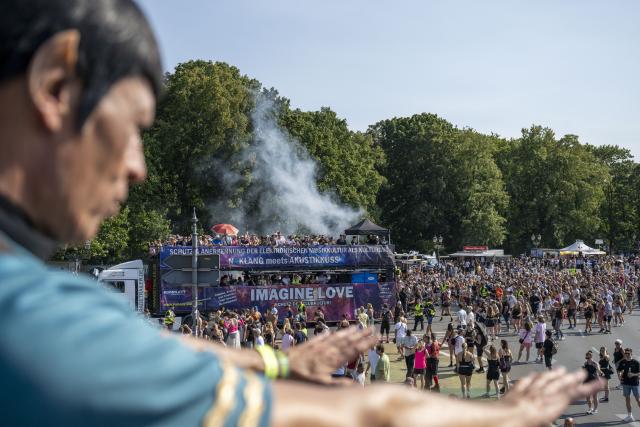 15 August 2026, Berlin: Participants dance at the "Rave The Planet Parade 2026" demonstration. Photo: Christophe Gateau/dpa