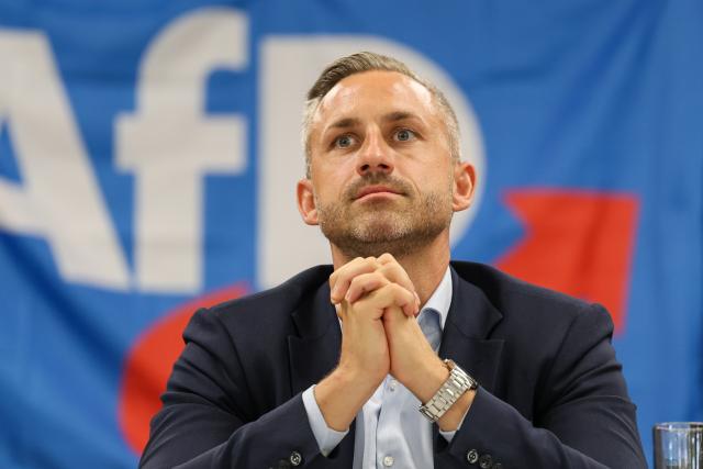17 August 2026, Saxony-Anhalt, Weferlingen: Ulrich Siegmund, lead candidate of the Alternative for Germany party in Saxony-Anhalt, attends an AfD town hall meeting in Weferlingen regarding the 2026 state election. Photo: Peter Gercke/dpa