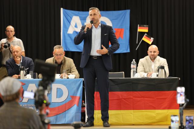 17 August 2026, Saxony-Anhalt, Weferlingen: Ulrich Siegmund, lead candidate of the Alternative for Germany party in Saxony-Anhalt, attends an AfD town hall meeting in Weferlingen regarding the 2026 state election. Photo: Peter Gercke/dpa