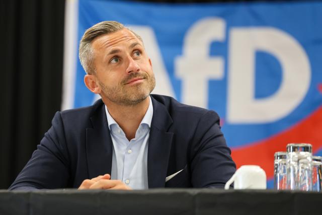 17 August 2026, Saxony-Anhalt, Weferlingen: Ulrich Siegmund, lead candidate of the Alternative for Germany party in Saxony-Anhalt, attends an AfD town hall meeting in Weferlingen regarding the 2026 state election. Photo: Peter Gercke/dpa