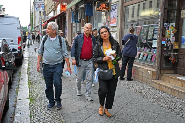 19 August 2026, Berlin: Board members of the Turkish Federation in Berlin-Brandenburg (TBB) hand out flyers on Oranien street, ahead of the Berlin House of Representatives election. The TBB is launching a campaign to increase voter turnout among citizens of Turkish descent. Photo: Michael Brandt/dpa