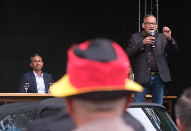 19 August 2026, Saxony-Anhalt, Dessau-Roßlau: Martin Reichardt (R), parliamentary group leader of the Alternative for Germany (AfD) in the Saxony-Anhalt state legislature, speaks at a campaign rally. Photo: Sebastian Willnow/dpa